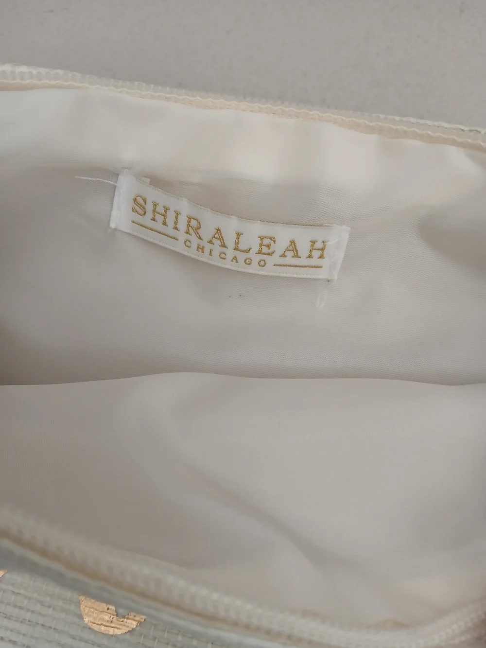 Shiraleah Cream Canvas Pouch with Gold Script and Pom Pom